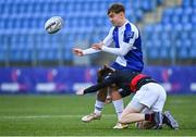 9 January 2024; Victor Killane of St Andrews College is tackled by Charlie O'Neill of The High School during the Bank of Ireland Vinnie Murray Cup Round 1 match between The High School and St Andrews College at Energia Park in Dublin. Photo by Tyler Miller/Sportsfile