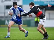 9 January 2024; Scott Behan of St Andrews College in action against Leo Kilroy of The High School during the Bank of Ireland Vinnie Murray Cup Round 1 match between The High School and St Andrews College at Energia Park in Dublin. Photo by Tyler Miller/Sportsfile
