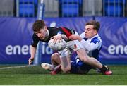 9 January 2024; Evan Kelleher of The High School dives over to score his side's second try despite the efforts of Victor Killane of St Andrews College during the Bank of Ireland Vinnie Murray Cup Round 1 match between The High School and St Andrews College at Energia Park in Dublin. Photo by Tyler Miller/Sportsfile
