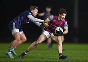 9 January 2024; Cian Monaghan of University of Galway is fouled by Jack Lundy of TU Dublin during the Electric Ireland Higher Education GAA Sigerson Cup Round 1 match between University of Galway and TU Dublin at Dangan in Galway. Photo by Stephen Marken/Sportsfile