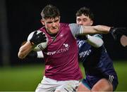 9 January 2024; Cillian O'Curraoin of University of Galway in action against Danny McCartin of TU Dublin during the Electric Ireland Higher Education GAA Sigerson Cup Round 1 match between University of Galway and TU Dublin at Dangan in Galway. Photo by Stephen Marken/Sportsfile