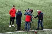10 January 2024; Derry City new signing Patrick Hoban speaks with Keiron Tourish of BBC Northern Ireland during a press conference at The Ryan McBride Brandywell Stadium in Derry. Photo by Stephen McCarthy/Sportsfile