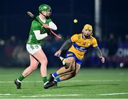 10 January 2024; Emmet McEvoy of Limerick in action against Mark Rodgers of Clare during the Co-Op Superstores Munster Hurling League Group A match between Clare and Limerick at Clarecastle GAA astro pitch in Clare. Photo by Piaras Ó Mídheach/Sportsfile