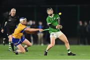 10 January 2024; Patrick O'Donovan of Limerick shoots under pressure from Diarmuid Ryan of Clare during the Co-Op Superstores Munster Hurling League Group A match between Clare and Limerick at Clarecastle GAA astro pitch in Clare. Photo by Piaras Ó Mídheach/Sportsfile