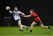 10 January 2024; Niall Loughlin of Ulster University in action against Damien Bourke of UCC during the Electric Ireland Higher Education GAA Sigerson Cup Round 1 match between Ulster University and UCC at the GAA National Games Development Centre in Abbotstown, Dublin. Photo by Stephen Marken/Sportsfile