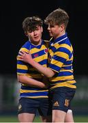 11 January 2024; Skerries Community College players Paul Ellis, left, and Joseph Kilbride after their side's defeat in the Bank of Ireland Fr Godfrey Cup Round 1 match between Skerries Community College and St Gerards School at Energia Park in Dublin. Photo by Seb Daly/Sportsfile