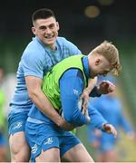 12 January 2024; Tommy O'Brien is tackled by Dan Sheehan during a Leinster Rugby captain's run at the Aviva Stadium in Dublin. Photo by Harry Murphy/Sportsfile