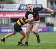 11 January 2024; Ben Shenton of The High School is tackled by Lewis Keary of The King’s Hospital during the Bank of Ireland Fr Godfrey Cup Round 1 match between The King's Hospital and The High School at Energia Park in Dublin. Photo by Seb Daly/Sportsfile