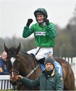 12 January 2024; Jockey Daryl Jacob celebrates after winning the Lawlor's Of Naas Novice Hurdle on Readin Tommy Wrong at Naas Racecourse in Kildare. Photo by Seb Daly/Sportsfile