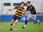 11 January 2024; Lewis Keary of The King’s Hospital is tackled by Seamus Walsh of The High School during the Bank of Ireland Fr Godfrey Cup Round 1 match between The King's Hospital and The High School at Energia Park in Dublin. Photo by Seb Daly/Sportsfile