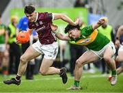 12 January 2024; Cillian Ó Curraoin of Galway in action against Donal Casey of Leitrim during the Connacht FBD League semi-final match between Leitrim and Galway at University of Galway Connacht GAA AirDome in Bekan, Mayo. Photo by Piaras Ó Mídheach/Sportsfile
