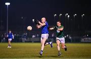 12 January 2024; Barry O'Farrell of Longford in action against Daire Rowe of Meath during the O'Byrne Cup Semi-Final match between Meath and Longford at Donaghmore Ashbourne GAA Club in Ashbourne, Meath. Photo by Ramsey Cardy/Sportsfile
