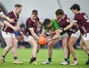 12 January 2024; Pearce Dolan of Leitrim is tackled by four Galway players, from left, Keith O'Reilly, Shane McGrath, Jack O'Neill and Cian Monaghan during the Connacht FBD League semi-final match between Leitrim and Galway at University of Galway Connacht GAA AirDome in Bekan, Mayo. Photo by Piaras Ó Mídheach/Sportsfile
