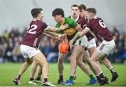 12 January 2024; Jamie McGreal of Leitrim is tackled by five Galway players, from left, Ryan Monaghan, Antaine Ó Laoi, Céin Darcy, Jack O'Neill and Jack Kirrane, 6, during the Connacht FBD League semi-final match between Leitrim and Galway at University of Galway Connacht GAA AirDome in Bekan, Mayo. Photo by Piaras Ó Mídheach/Sportsfile