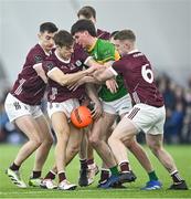 12 January 2024; Jamie McGreal of Leitrim is tackled by five Galway players, from left, Antaine Ó Laoi, Ryan Monaghan, Jack O'Neill, Céin Darcy and Jack Kirrane during the Connacht FBD League semi-final match between Leitrim and Galway at University of Galway Connacht GAA AirDome in Bekan, Mayo. Photo by Piaras Ó Mídheach/Sportsfile