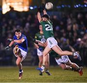 12 January 2024; Dylan Farrell of Longford kicks a point under pressure from Brendan McKeon, 20, and Brian O’Reilly of Meath during the O'Byrne Cup Semi-Final match between Meath and Longford at Donaghmore Ashbourne GAA Club in Ashbourne, Meath. Photo by Ramsey Cardy/Sportsfile
