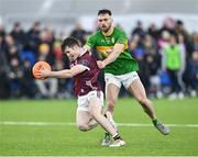 12 January 2024; Liam Boyle of Galway is fouled by Conor Reynolds of Leitrim during the Connacht FBD League semi-final match between Leitrim and Galway at University of Galway Connacht GAA AirDome in Bekan, Mayo. Photo by Piaras Ó Mídheach/Sportsfile