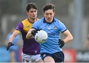 13 January 2024; Killian McGinnis of Dublin in action against Cathal Walsh of Wexford during the O'Byrne Cup semi-final match between Dublin and Wexford at Parnell Park in Dublin. Photo by Stephen Marken/Sportsfile