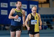 13 January 2024; John Egan of St Killians AC, Wexford, left, and Graham Bourne of Kilkenny City Harriers AC, Kilkenny, compete in the men's over 40 3000m Walk during the 123.ie National Masters Indoor Championships at the TUS International arena in Athlone, Westmeath. Photo by Tyler Miller/Sportsfile