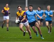 13 January 2024; Ben Brosnan of Wexford in action against Alex Gavin of Dublin during the O'Byrne Cup semi-final match between Dublin and Wexford at Parnell Park in Dublin. Photo by Stephen Marken/Sportsfile