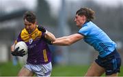 13 January 2024; Ben Brosnan of Wexford in action against Ethan Dunne of Dublin during the O'Byrne Cup semi-final match between Dublin and Wexford at Parnell Park in Dublin. Photo by Stephen Marken/Sportsfile