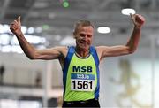 13 January 2024; Shane Healy of Metro/St Brigids AC, Dublin, celebrates after breaking the men's 800m over 55 world record with a time of 2:02.46 after competing in the men's over 55 800m during the 123.ie National Masters Indoor Championships at the TUS International arena in Athlone, Westmeath. Photo by Tyler Miller/Sportsfile