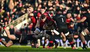 13 January 2024; Peter O’Mahony of Munster is tackled by Kieran Brookes, left, and Dany Priso of Toulon during the Investec Champions Cup Pool 3 Round 3 match between RC Toulon and Munster at Stade Felix Mayol in Toulon, France. Photo by Eóin Noonan/Sportsfile