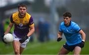 13 January 2024; Richie Waters of Wexford in action against Liam Smith of Dublin during the O'Byrne Cup semi-final match between Dublin and Wexford at Parnell Park in Dublin. Photo by Stephen Marken/Sportsfile