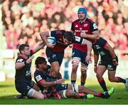 13 January 2024; Antoine Frisch of Munster is tackled by Dan Biggar, left, and Matthias Halagahu of Toulon during the Investec Champions Cup Pool 3 Round 3 match between RC Toulon and Munster at Stade Felix Mayol in Toulon, France. Photo by Eóin Noonan/Sportsfile