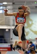 13 January 2024; Michelle During of City of Derry Spartans, Derry, competes in the women's over 35 Triple Jump during the 123.ie National Masters Indoor Championships at the TUS International arena in Athlone, Westmeath. Photo by Tyler Miller/Sportsfile