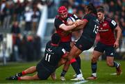 13 January 2024; John Hodnett of Munster is tackled by Leicester Fainga'anuku an Waisea Nayacalevu of Toulon during the Investec Champions Cup Pool 3 Round 3 match between RC Toulon and Munster at Stade Felix Mayol in Toulon, France. Photo by Eóin Noonan/Sportsfile