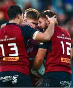 13 January 2024; Alex Nankivell of Munster, right, celebrates with teammates Antoine Frisch and Jack Crowley after scoring their side's first try during the Investec Champions Cup Pool 3 Round 3 match between RC Toulon and Munster at Stade Felix Mayol in Toulon, France. Photo by Eóin Noonan/Sportsfile