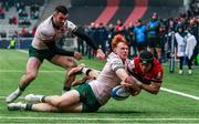 13 January 2024; Thaakir Abrahams of Lyon is tackled by Shane Jennings and Andrew Smith of Connacht during the Investec Champions Cup Pool 1 Round 3 match between Lyon and Connacht at Matmut Stadium de Gerland in Lyon, France. Photo by Romain Biard/Sportsfile