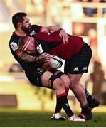 13 January 2024; John Ryan of Munster is tackled by Cornell Du Preez of Toulon during the Investec Champions Cup Pool 3 Round 3 match between RC Toulon and Munster at Stade Felix Mayol in Toulon, France. Photo by Eóin Noonan/Sportsfile