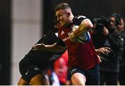 13 January 2024; Shane Daly of Munster is tackled by Facundo Isa of Toulon during the Investec Champions Cup Pool 3 Round 3 match between RC Toulon and Munster at Stade Felix Mayol in Toulon, France. Photo by Eóin Noonan/Sportsfile