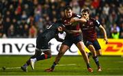 13 January 2024; Niall Scannell of Munster is tackled by Setariki Tuicuvu of Toulon during the Investec Champions Cup Pool 3 Round 3 match between RC Toulon and Munster at Stade Felix Mayol in Toulon, France. Photo by Eóin Noonan/Sportsfile