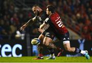 13 January 2024; Beka Gigashvili of Toulon is tackled by Joey Carbery of Munster during the Investec Champions Cup Pool 3 Round 3 match between RC Toulon and Munster at Stade Felix Mayol in Toulon, France. Photo by Eóin Noonan/Sportsfile