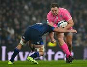 13 January 2024; JJ van der Mescht of Stade Francais is tackled by Caelan Doris of Leinster during the Investec Champions Cup Pool 4 Round 3 match between Leinster and Stade Francais at the Aviva Stadium in Dublin. Photo by Seb Daly/Sportsfile