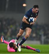 13 January 2024; Hugo Keenan of Leinster is tackled by Kylan Hamdaoui of Stade Francais during the Investec Champions Cup Pool 4 Round 3 match between Leinster and Stade Francais at the Aviva Stadium in Dublin. Photo by Sam Barnes/Sportsfile