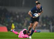 13 January 2024; Hugo Keenan of Leinster is tackled by Kylan Hamdaoui of Stade Francais during the Investec Champions Cup Pool 4 Round 3 match between Leinster and Stade Francais at the Aviva Stadium in Dublin. Photo by Sam Barnes/Sportsfile