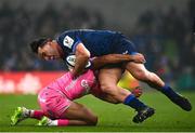 13 January 2024; James Lowe of Leinster is tackled by Zack Henry of Stade Francais during the Investec Champions Cup Pool 4 Round 3 match between Leinster and Stade Francais at the Aviva Stadium in Dublin. Photo by Harry Murphy/Sportsfile