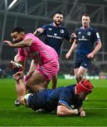 13 January 2024; Josh van der Flier of Leinster scores his side's second try despite the efforts of Zack Henry of Stade Francais during the Investec Champions Cup Pool 4 Round 3 match between Leinster and Stade Francais at the Aviva Stadium in Dublin. Photo by Sam Barnes/Sportsfile