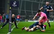 13 January 2024; Josh van der Flier of Leinster scores his side's second try despite the efforts of Leo Monin of Stade Francais during the Investec Champions Cup Pool 4 Round 3 match between Leinster and Stade Francais at the Aviva Stadium in Dublin. Photo by Sam Barnes/Sportsfile