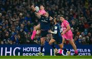13 January 2024; Andrew Porter of Leinster and Leo Monin of Stade Francais contest for the ball during the Investec Champions Cup Pool 4 Round 3 match between Leinster and Stade Francais at the Aviva Stadium in Dublin. Photo by Seb Daly/Sportsfile