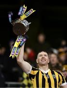 13 January 2024; Walter Walsh of Tullogher Rosbercon lifts the cup after his side's victory in the AIB GAA Hurling All-Ireland Junior Club Championship final match between St Catherine's of Cork and Tullogher Rosbercon of Kilkenny at Croke Park in Dublin. Photo by Piaras Ó Mídheach/Sportsfile