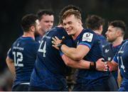 13 January 2024; Josh van der Flier of Leinster, right, and teammate Joe McCarthy after their side's victory in the Investec Champions Cup Pool 4 Round 3 match between Leinster and Stade Francais at the Aviva Stadium in Dublin. Photo by Seb Daly/Sportsfile