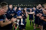 13 January 2024; Luke McGrath of Leinster, with his son Bobby, is given a guard of honor by his teammates after making his 200th Leinster appearance in the Investec Champions Cup Pool 4 Round 3 match between Leinster and Stade Francais at the Aviva Stadium in Dublin. Photo by Harry Murphy/Sportsfile