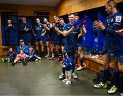 13 January 2024; Luke McGrath of Leinster in the changing room with his son Bobby after making his 200th appearance in the Investec Champions Cup Pool 4 Round 3 match between Leinster and Stade Francais at the Aviva Stadium in Dublin. Photo by Harry Murphy/Sportsfile