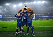 13 January 2024; Match day mascots Mabel Keating, aged seven, and Lauren Barrett, aged eight, with Leo the Lion before the Investec Champions Cup Pool 4 Round 3 match between Leinster and Stade Francais at the Aviva Stadium in Dublin. Photo by Harry Murphy/Sportsfile