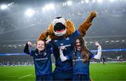 13 January 2024; Match day mascots Mabel Keating, aged seven, and Lauren Barrett, aged eight, with Leo the Lion before the Investec Champions Cup Pool 4 Round 3 match between Leinster and Stade Francais at the Aviva Stadium in Dublin. Photo by Harry Murphy/Sportsfile